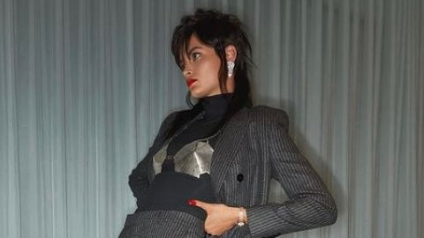 Model poses for Dansk Magazine in crystal earrings from Ben-Amun