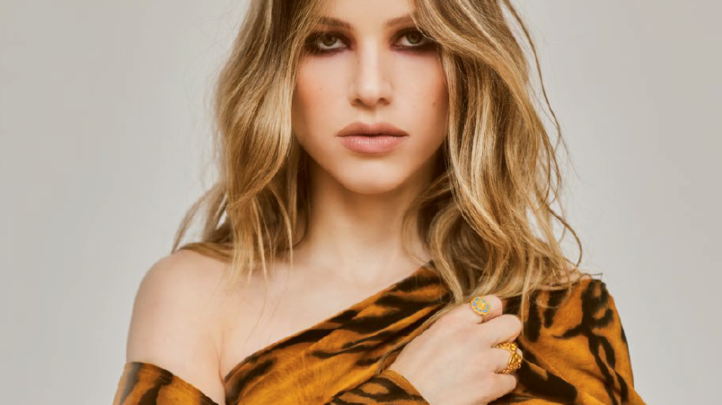 Halston Sage wears chunky gold-plated cuff from Ben-Amun