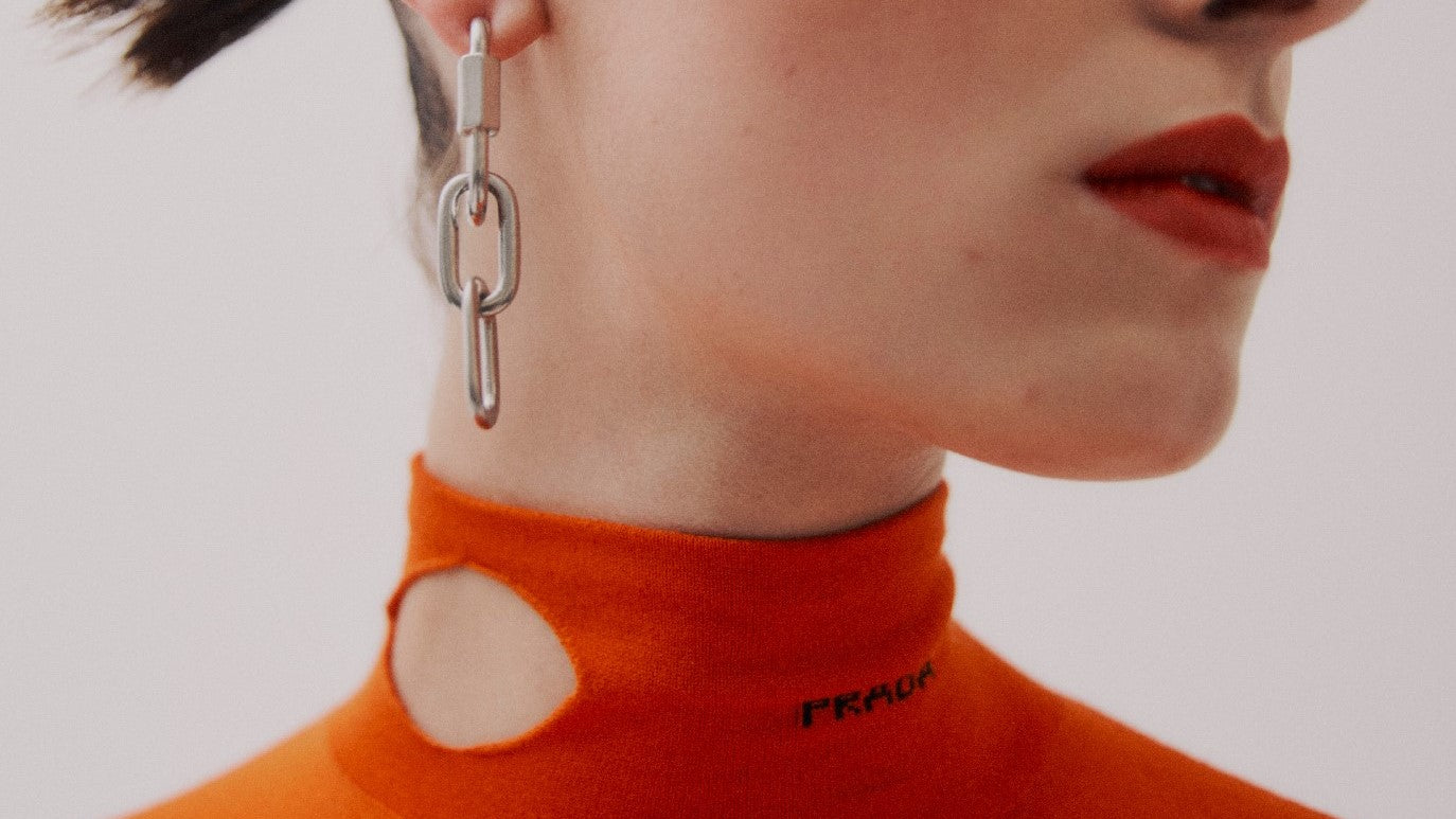 Model wears silver earrings from ben-Amun for Vogue Spain