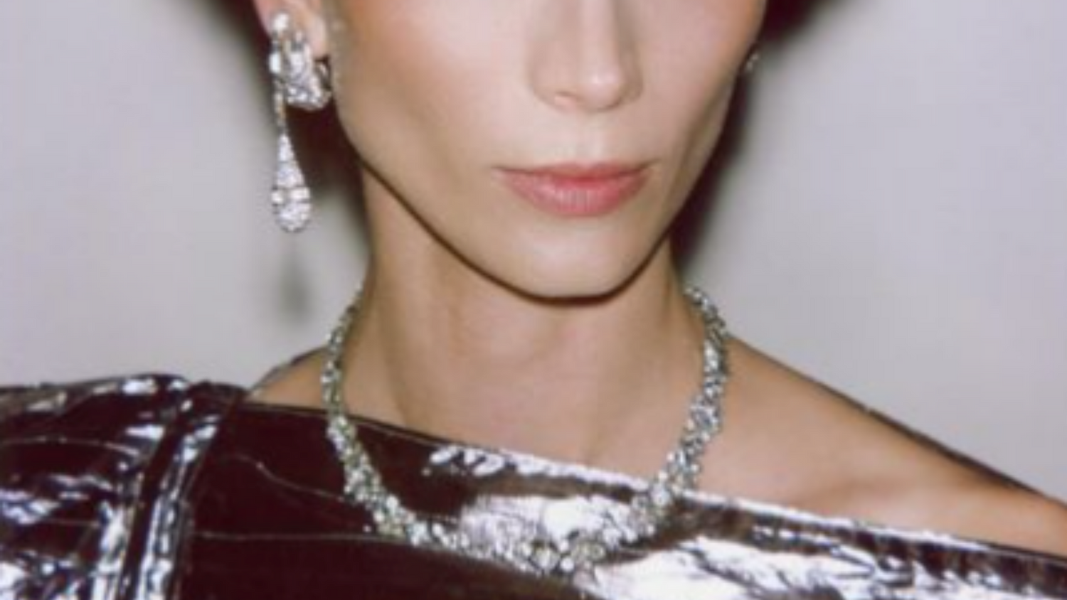 Model in crystal jewelry from Ben-Amun and shiny dress