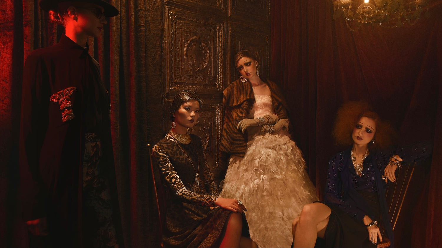 3 models pose in dark room for FAQ Magazine