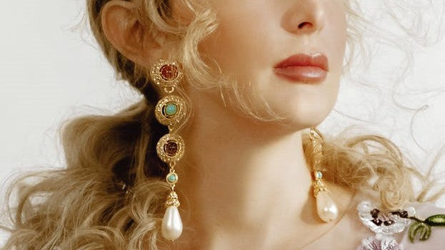 Model wears ben-Amun earrings for L'Officiel Brazil