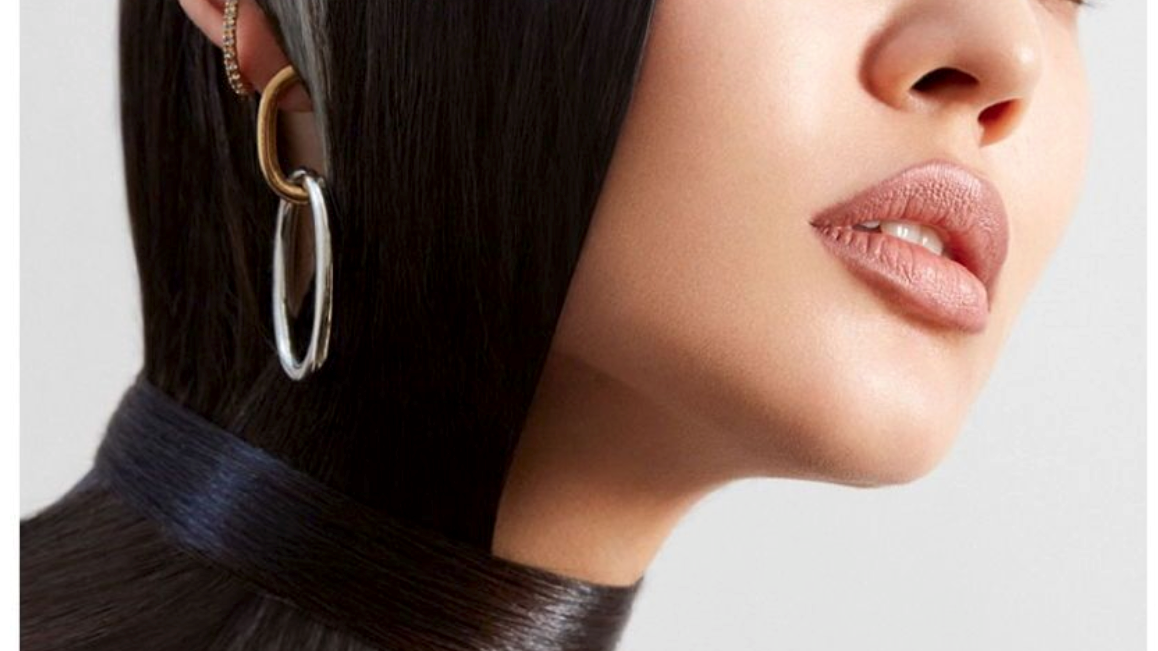 Model wearing Ben-Amun Sun & Moon collection earrings