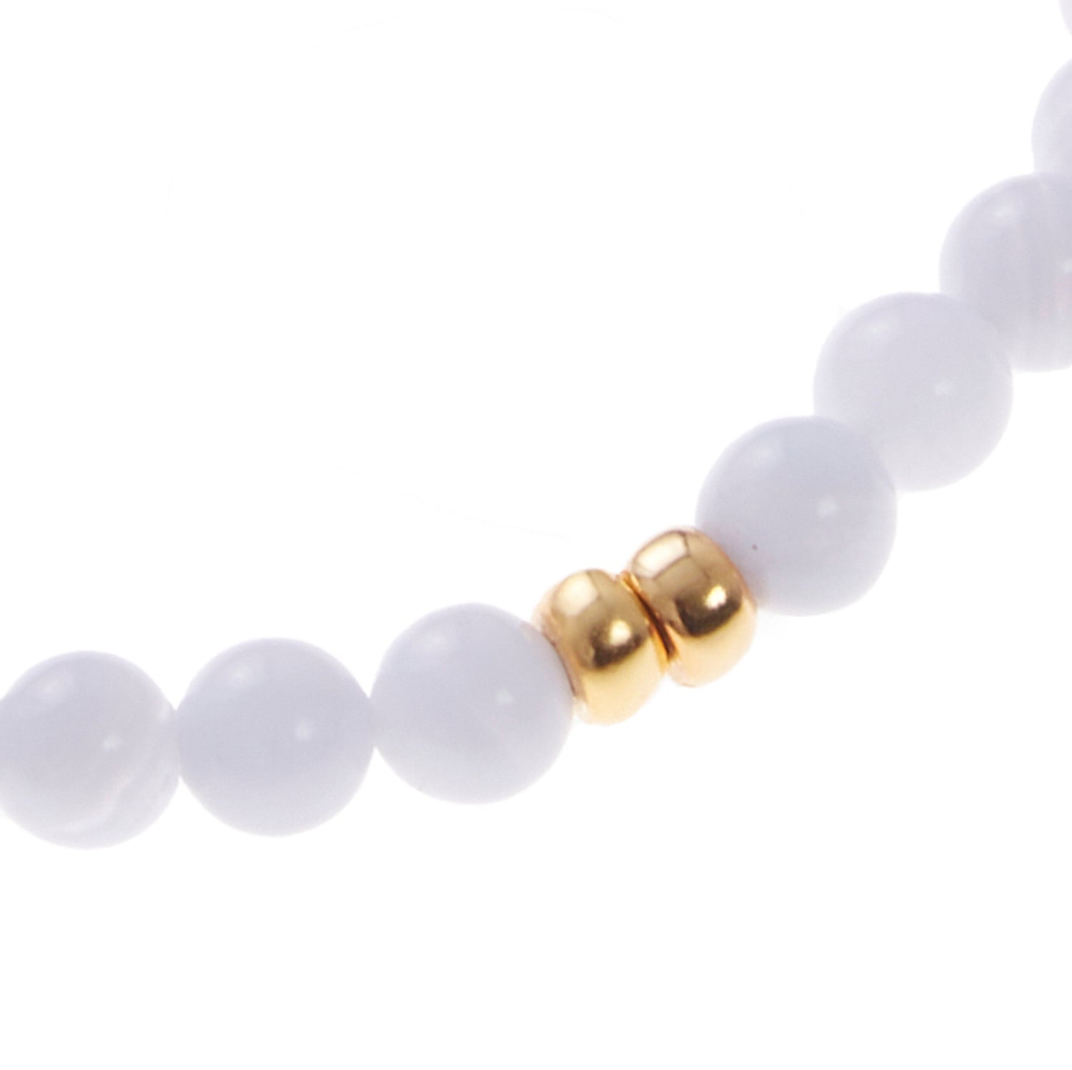 light purple stone bracelet with gold beads