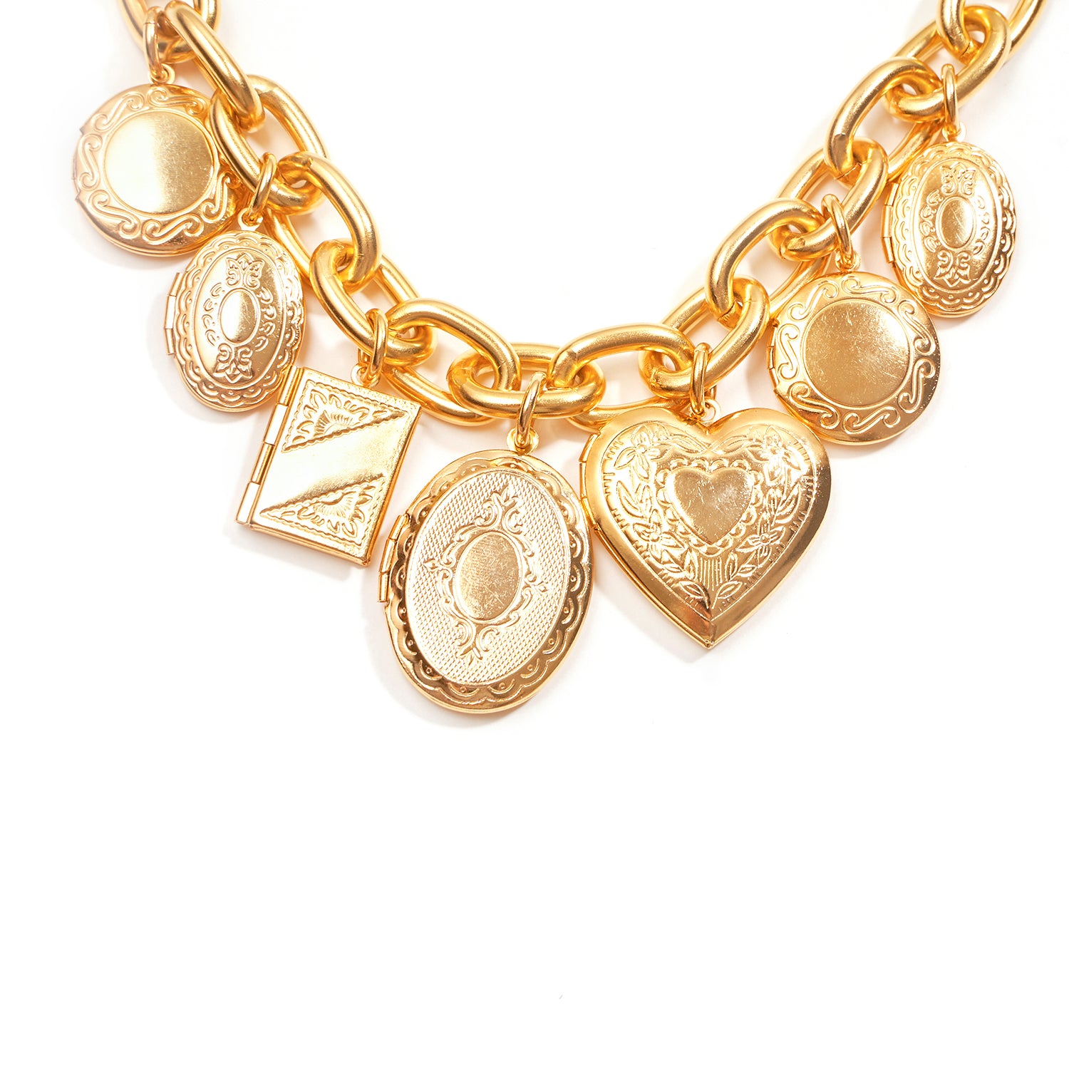 close up of 24k gold plated chain link bracelet with charms 