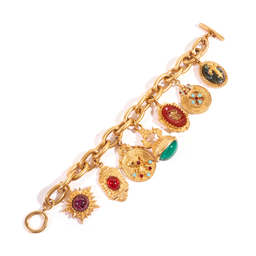 24k gold plated chain link bracelet with seven charms and toggle closure