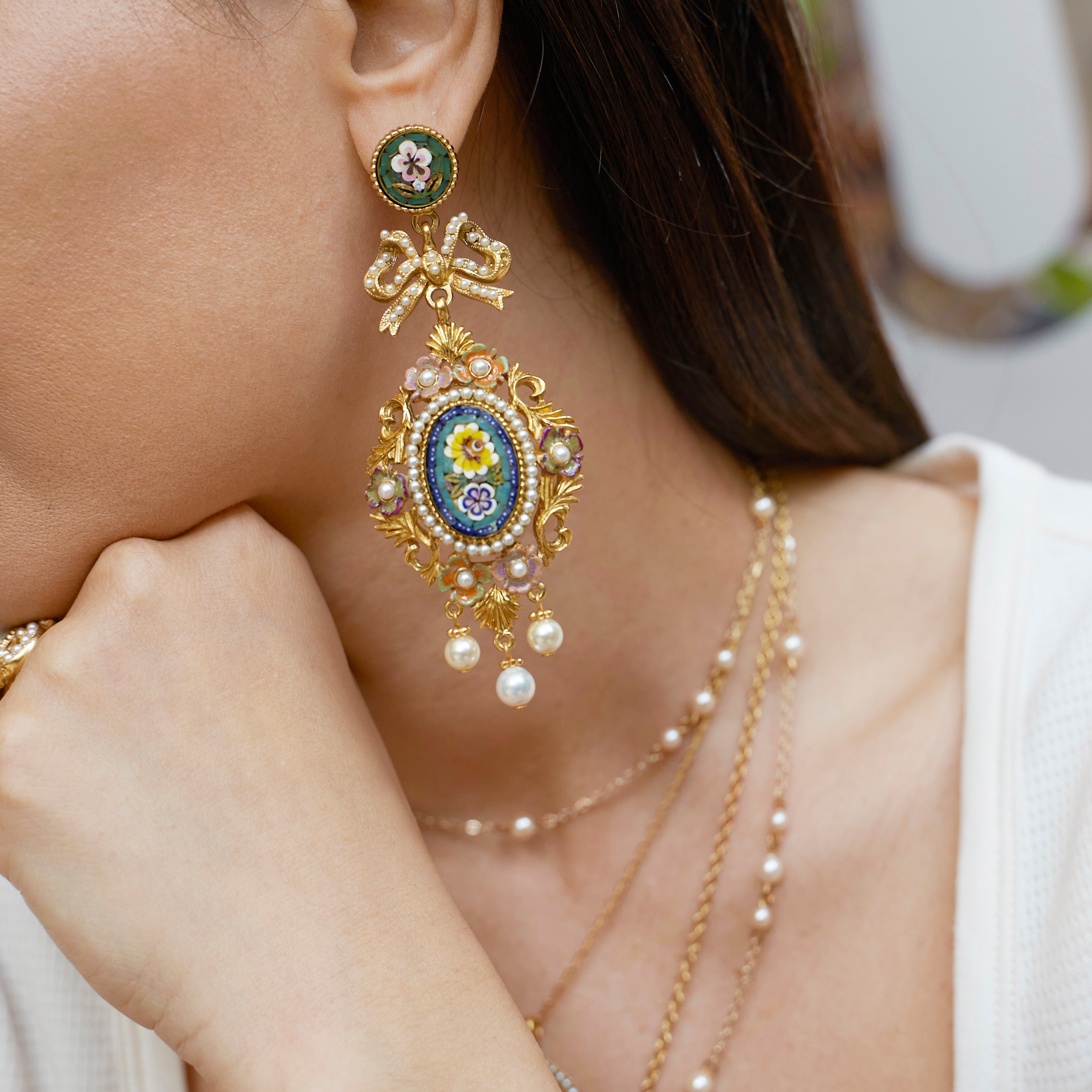Model wearing Ben-Amun Batola Earrings from Daphne Collection