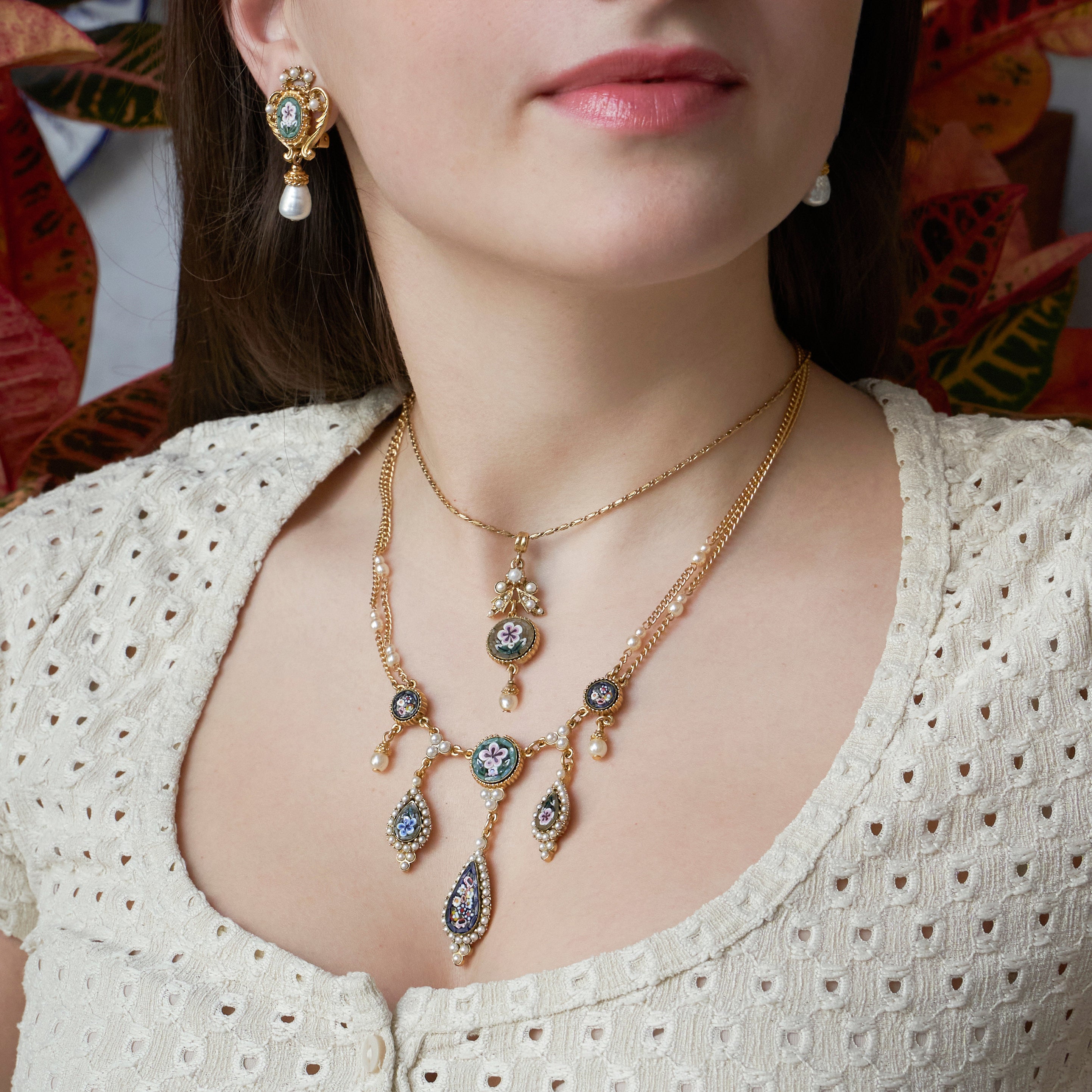 Model wearing Ben-Amun Daphne Collection earrings and necklaces