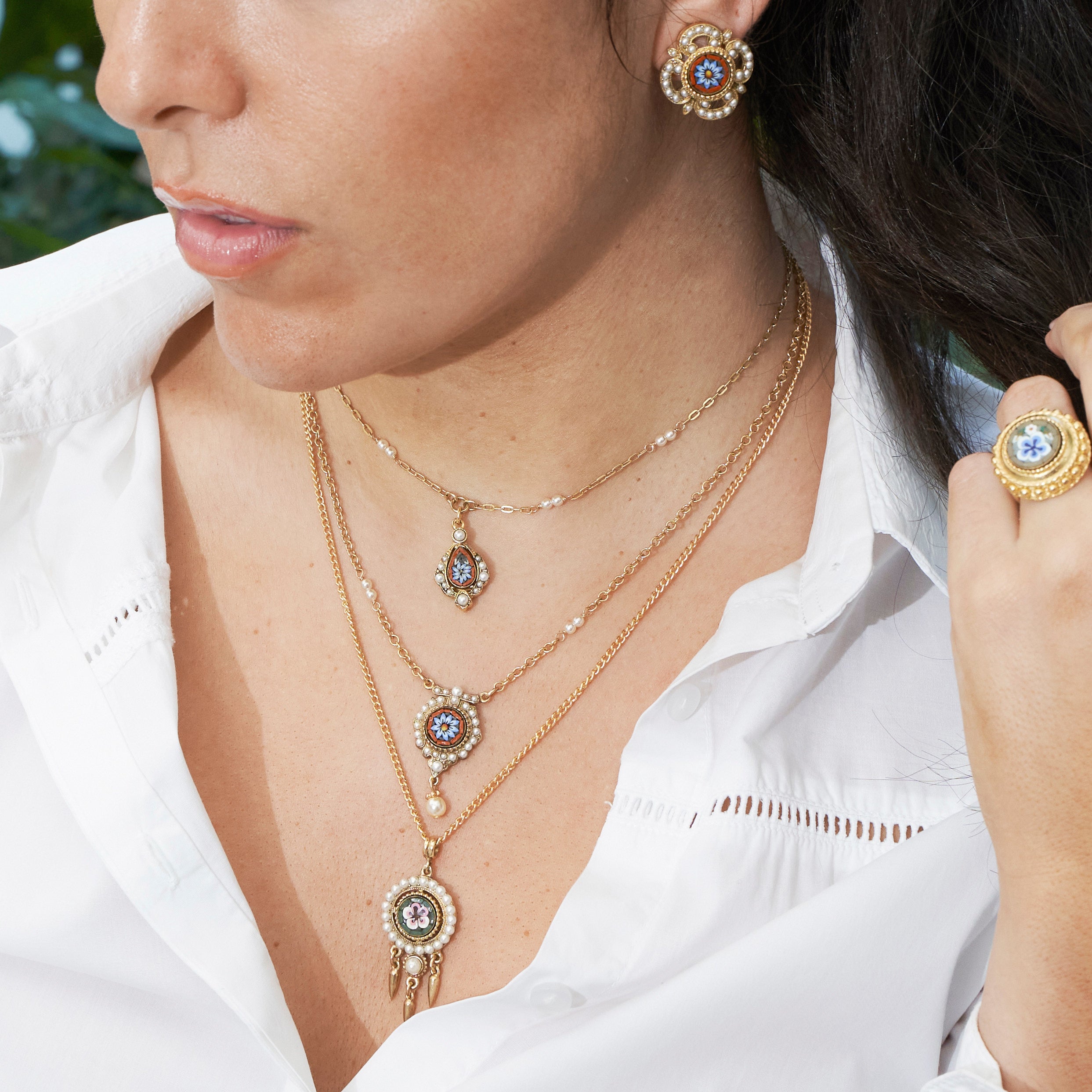 Model wearing Ben-Amun Daphne Collection Earrings, Necklaces, and Ring