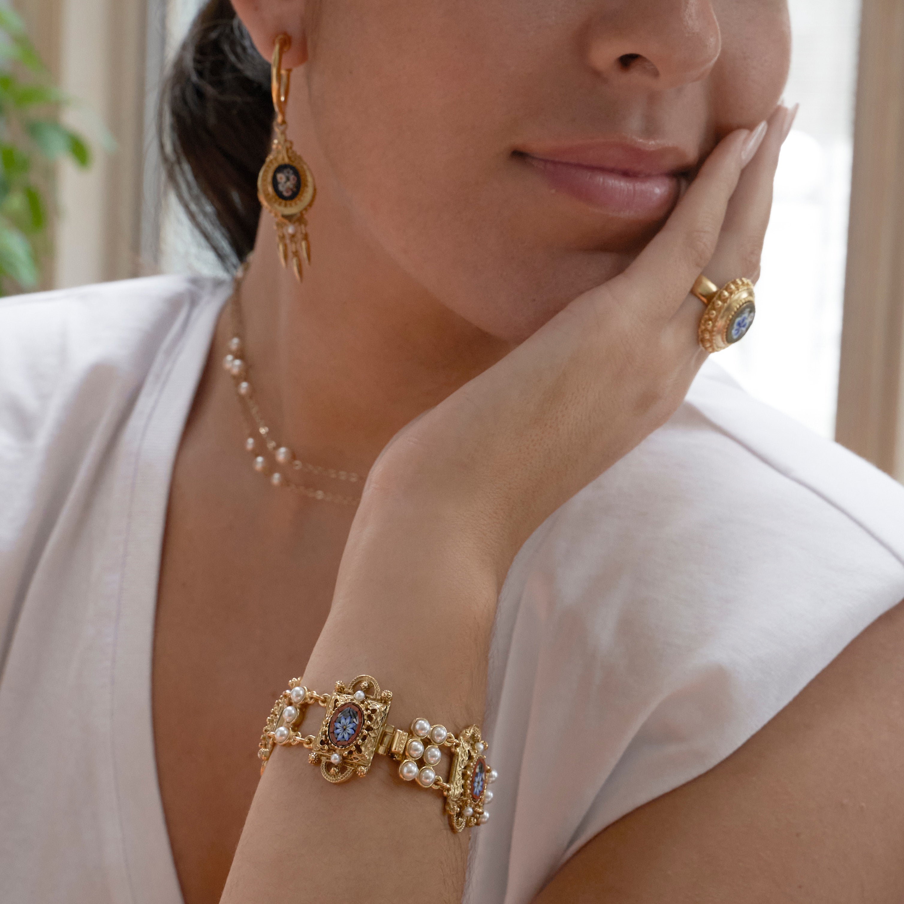 Model wearing Ben-Amun Daphne Collecton Earring,Necklace, Bracelet, and Ring