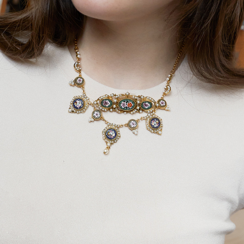 Model wearing Ben-Amun mosaic brooch paired with Daphne Collection mosaic necklace