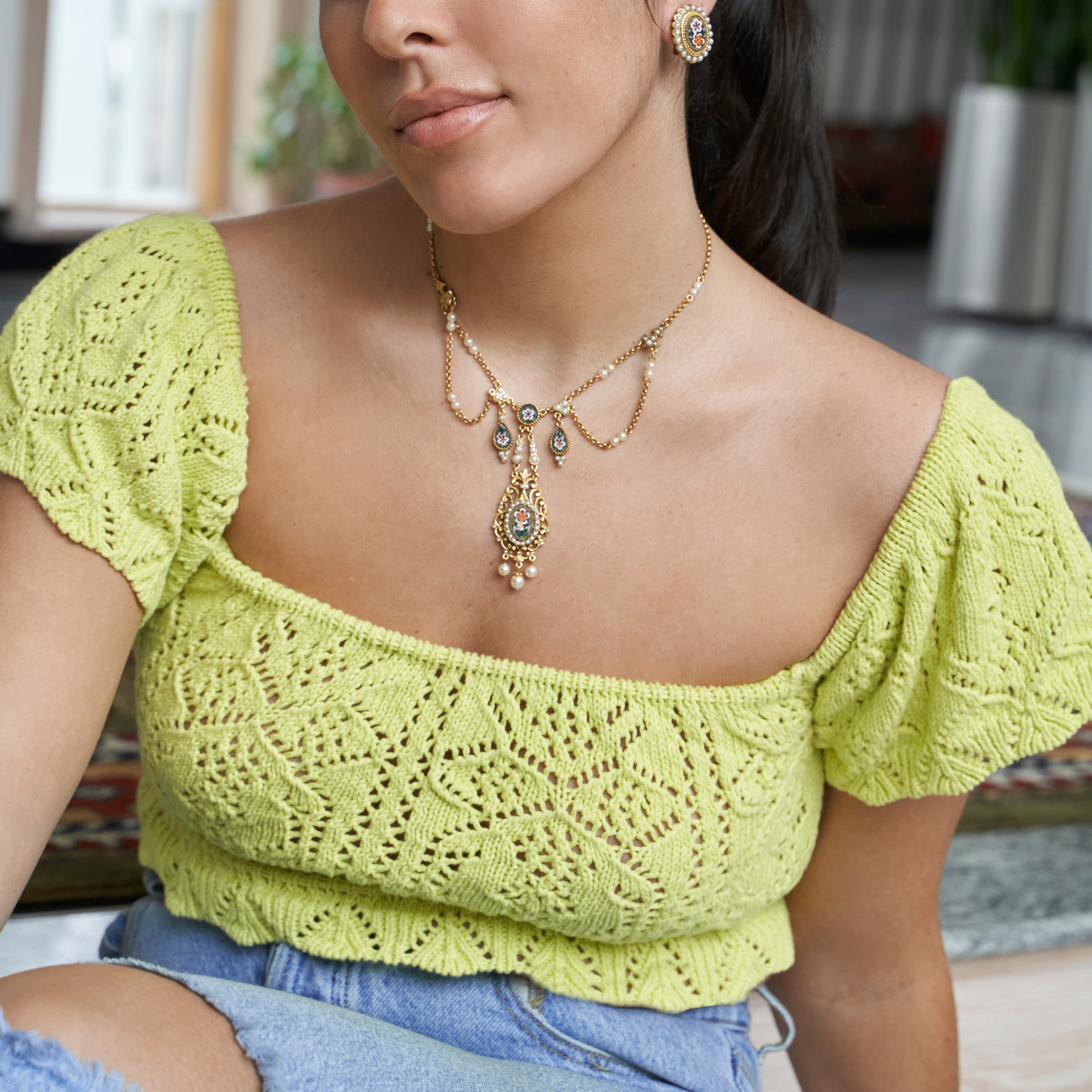 Model wearing Ben-Amun Mosaic and Pearl Necklace   