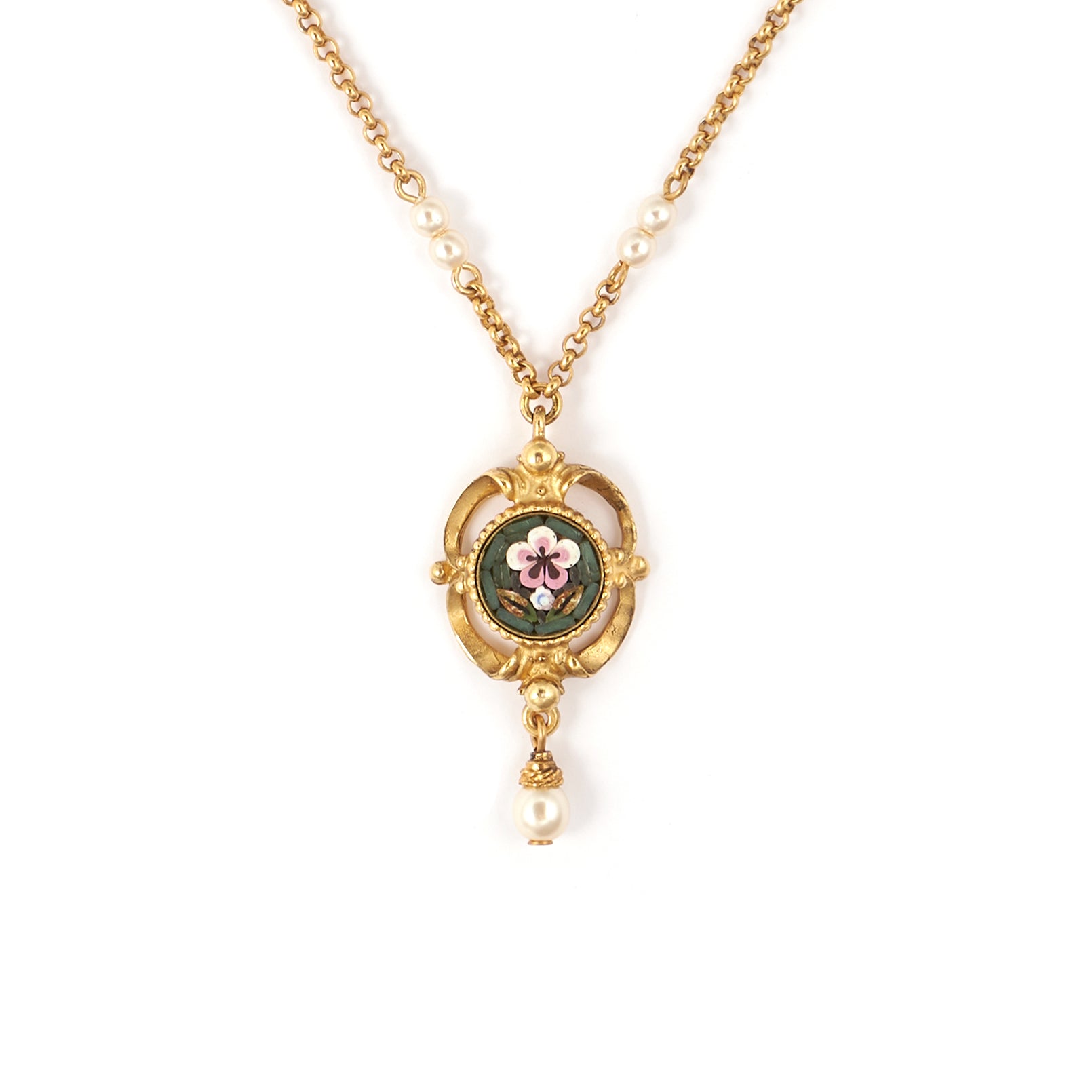 close up of micro mosaic and pears adorned on a gold plated necklace