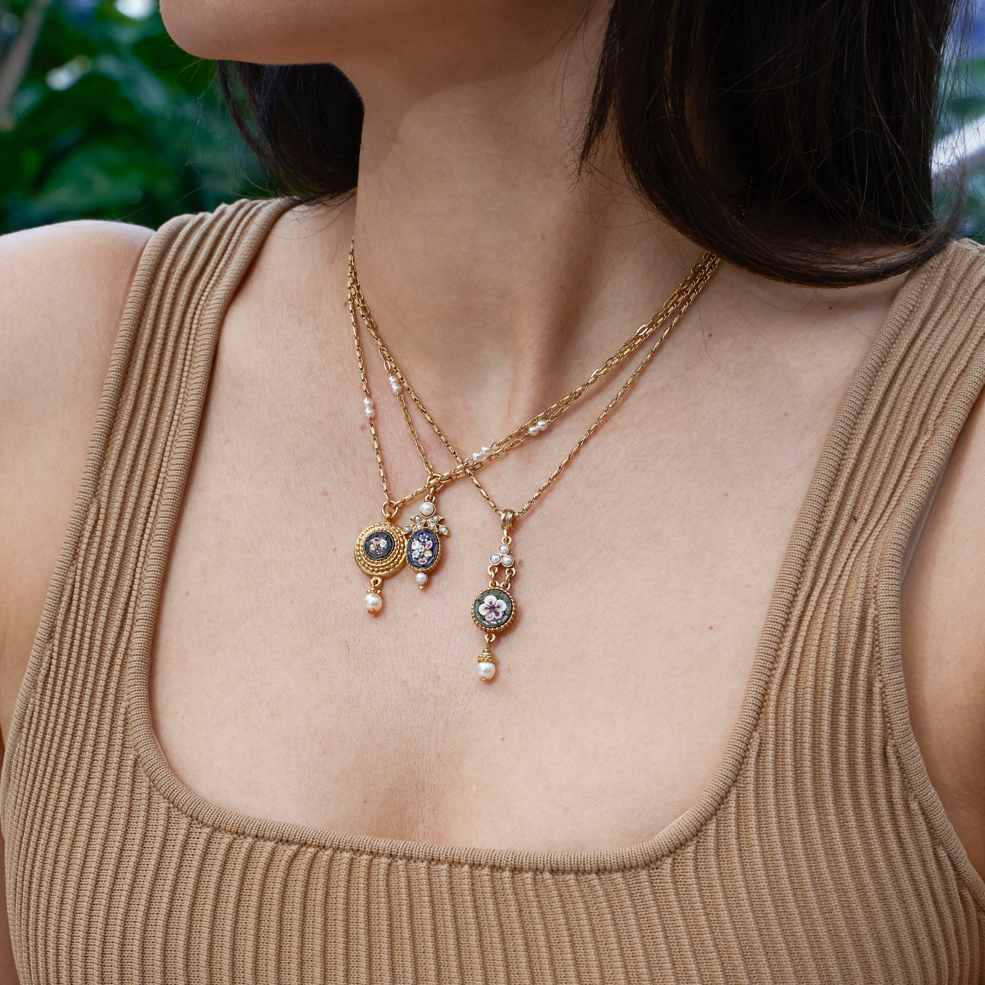 model wearing three Ben-Amun Daphne Collection necklaces