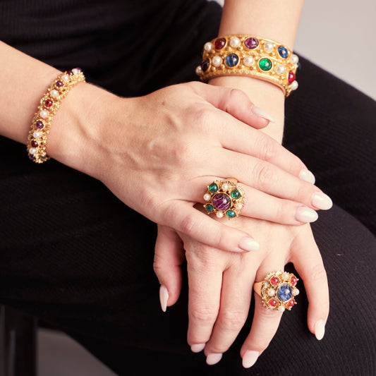 Model wearing Ben-Amun ring and bracelets adorned with majorca pearls and czech glass stones