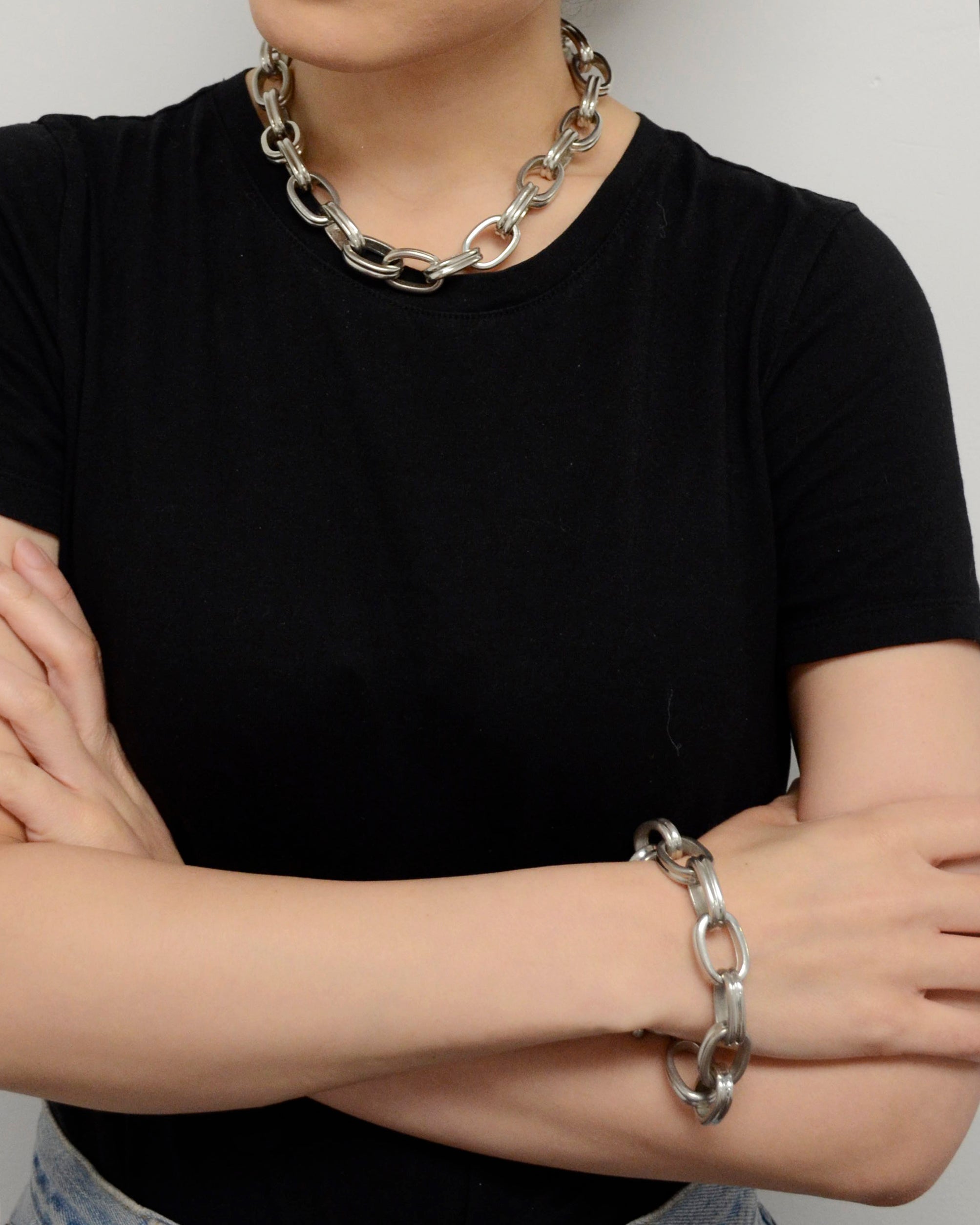 Model wearing two Ben-Amun handmade pieces from Silver Lining Collection