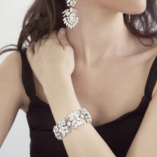 model wearing ben-amun pearl and crystal collection earrings and bracelet